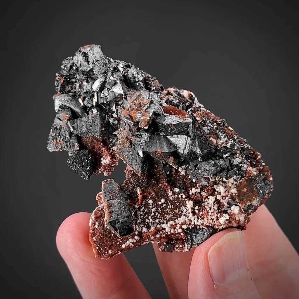 Braunite with Hausmannite and Andradite Garnet image
