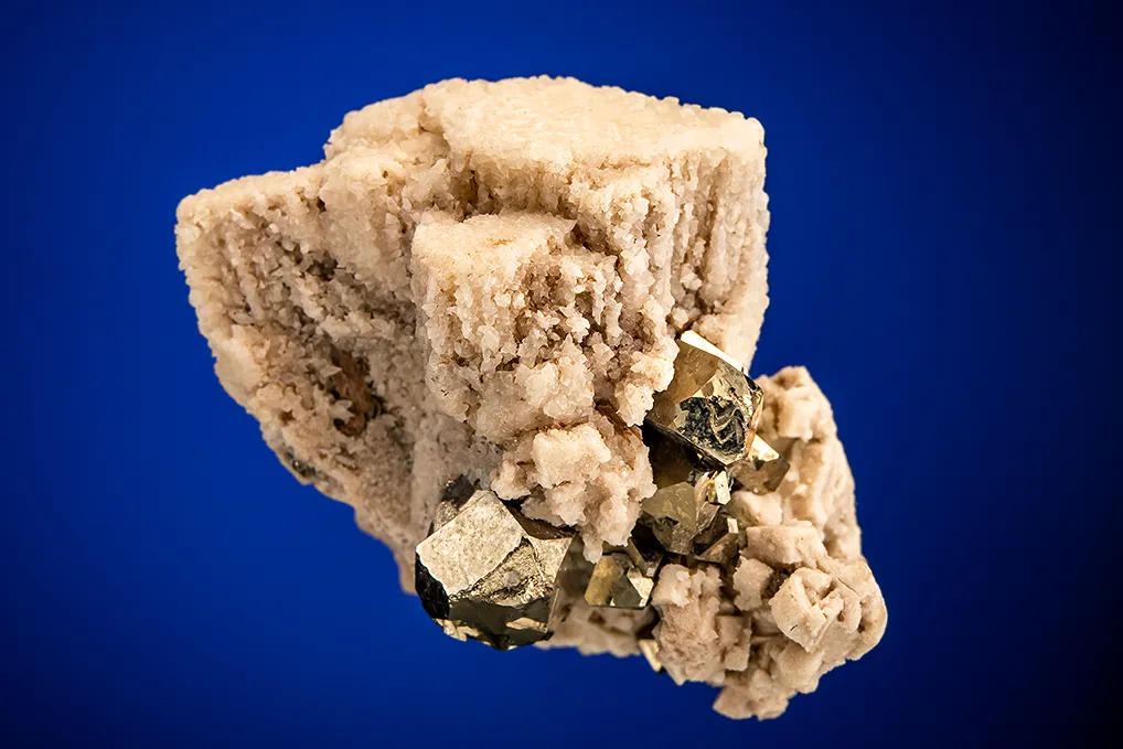 Calcite after Enargite with Pyrite image