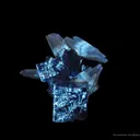 Calcite (Dt, Fluorescent) on Fluorite - image 5