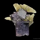 Calcite (Dt, Fluorescent) on Fluorite - image 2