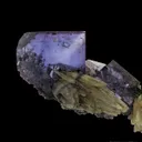 Calcite (Dt, Fluorescent) on Fluorite - image 3