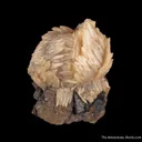Calcite (fl) on Fluorite - image 1