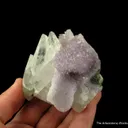 Calcite (fluor.) on Quartz var. Amethyst - image 3