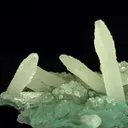 Calcite (fluorescent) and Celadonite on Quartz (var. Chalcedony) - image 3