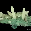 Calcite (fluorescent) and Celadonite on Quartz (var. Chalcedony) - image 1