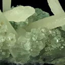 Calcite (fluorescent) and Celadonite on Quartz (var. Chalcedony) - image 5