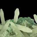 Calcite (fluorescent) and Celadonite on Quartz (var. Chalcedony) - image 2