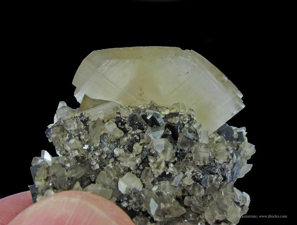 Calcite (Fluorescent) on Fluorite - image 2