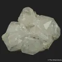 Calcite (fluorescent) on Quartz - image 1