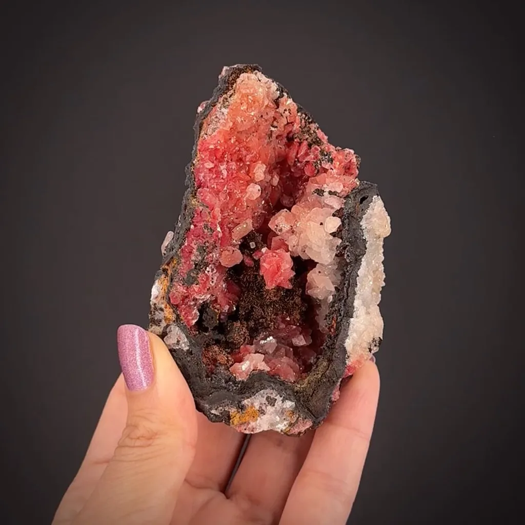 Calcite included by Cuprite var. Chalcotrichite image