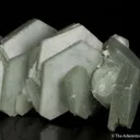 Calcite included by Hedenbergite - image 1