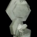 Calcite included by Hedenbergite - image 1