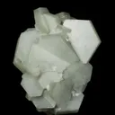 Calcite included by Hedenbergite - image 1