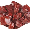 Calcite Included By Hematite - image 1