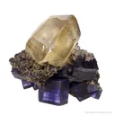 Calcite (twin) on Fluorite - image 1