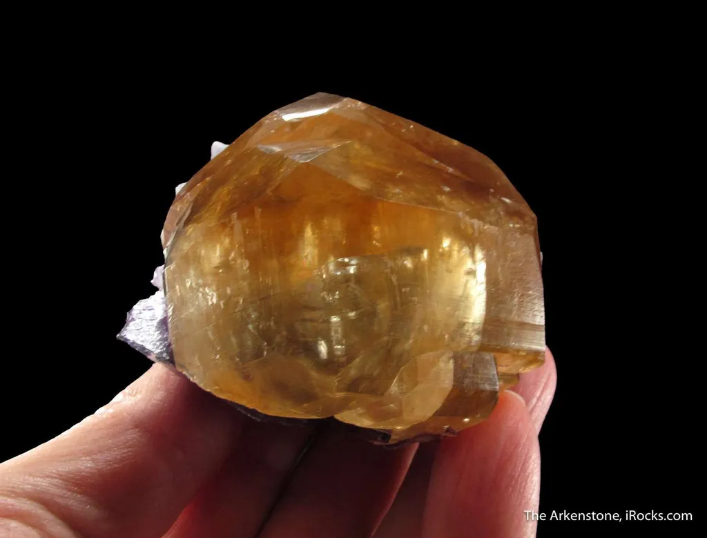 Calcite (twinned) on Fluorite - image 3