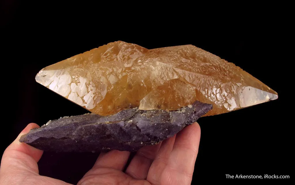Calcite (twinned) on Fluorite image