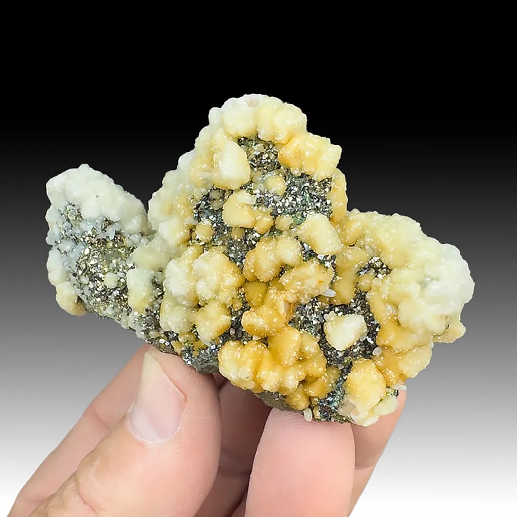 Calcite with Arsenopyrite on Pyrite after Pyrrhotite image