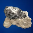 Calcite with Beryl var. Aquamarine on Quartz var. Smoky - image 2