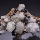 Calcite with Braunite and OYELITE - image 1