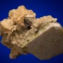 Calcite with Muscovite on Albite and Microcline - image 1