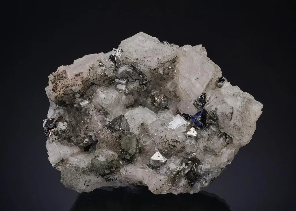 Carrollite with Chalcopyrite on Calcite image