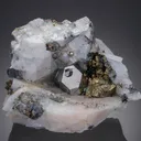 Carrollite with Pyrite on Calcite - image 1