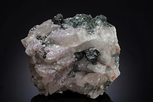 Cassiterite and Fluorite on Quartz - image 1