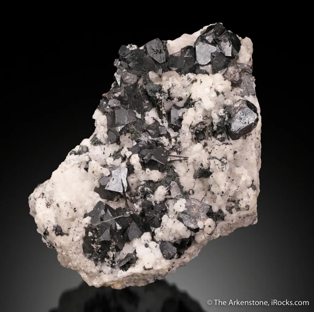 Cassiterite, Tourmaline, and Orthoclase image