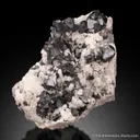 Cassiterite, Tourmaline, and Orthoclase - image 1