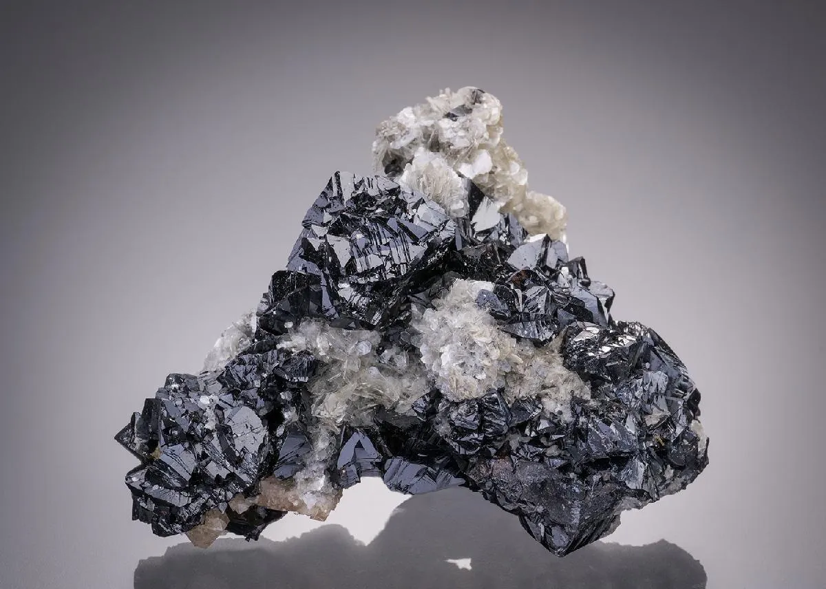 Cassiterite with Scheelite and Muscovite - image 1