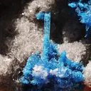 Cavansite var. Pentagonite from India.Bright blue bursting, snowflake like Pentagonite crystals w/ Stilbite on a sparkling Heulandite matrix - image 1