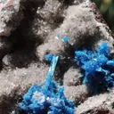 Cavansite var. Pentagonite from India.Bright blue bursting, snowflake like Pentagonite crystals w/ Stilbite on a sparkling Heulandite matrix - image 6