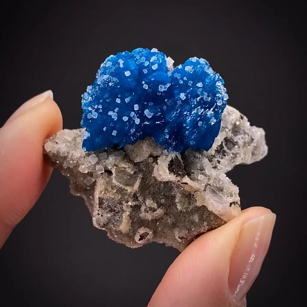 Cavansite with Calcite on Stilbite image