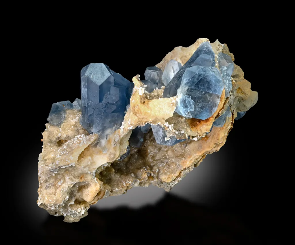 blue celestine crystals on calcite from Dara-i-Laman, Badghis, Afghanistan — credit: EarthWonders