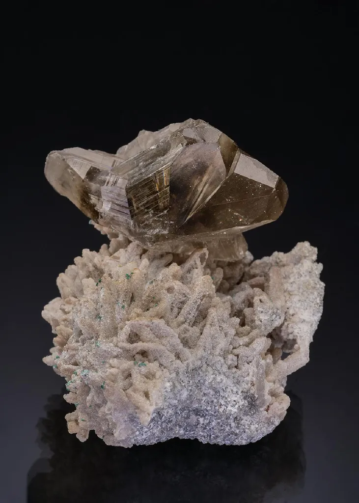 Cerussite with Calcite and Malachite on Quartz image
