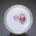 Corundum var. Pink Sapphire Uncut crystal and cut gem - image 1