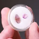 Corundum var. Pink Sapphire Uncut crystal and cut gem - image 2