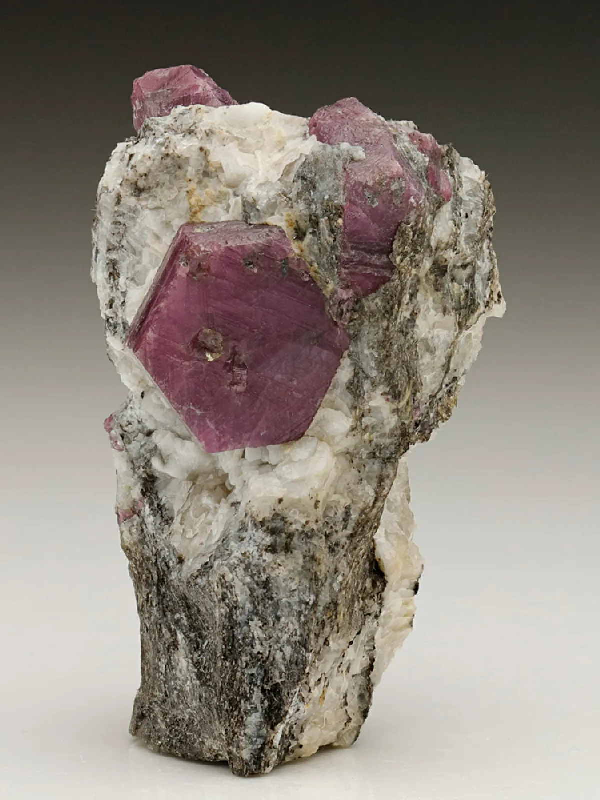 Corundum var. Ruby (in Biotite-Sillimanite-Gneiss) - image 1