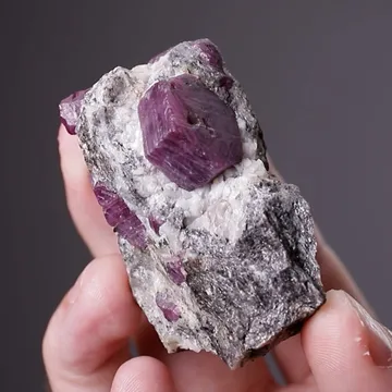Corundum var. Ruby (in Biotite-Sillimanite-Gneiss)
