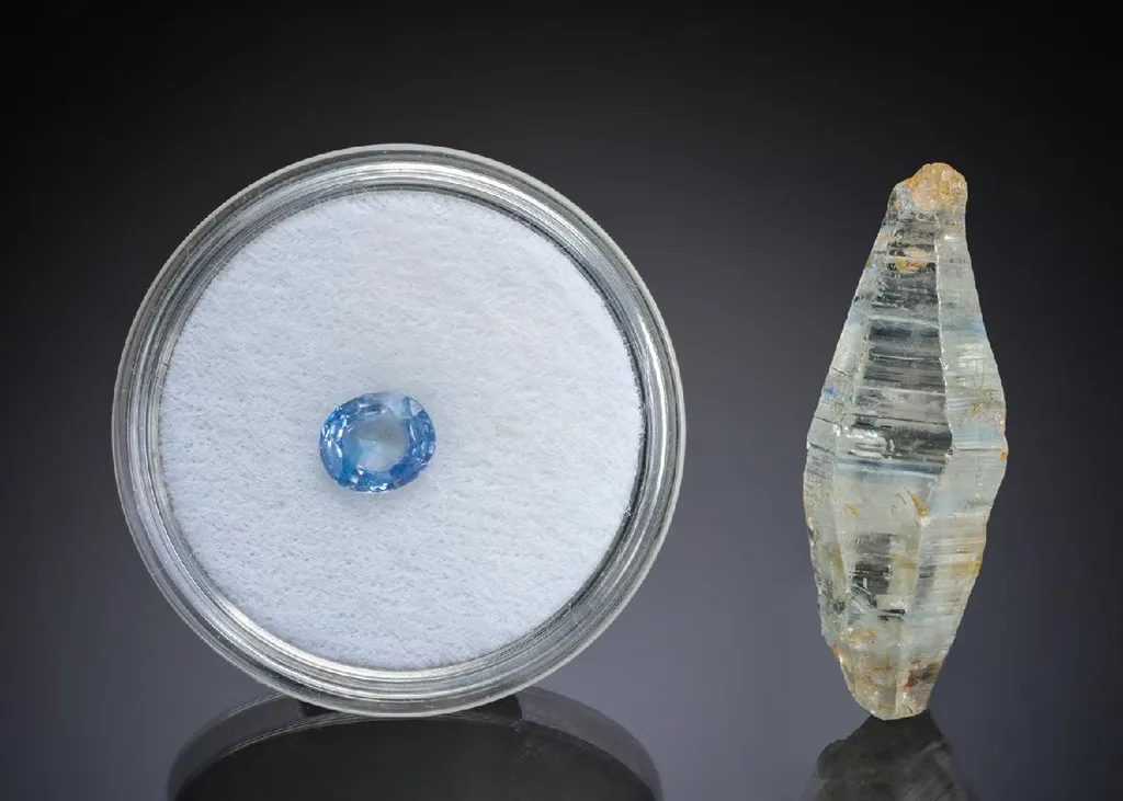 Corundum var. Sapphire Crystal + Cut Gem image