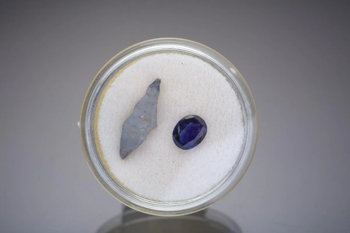 Corundum var. Sapphire Uncut crystal and cut gem - image 1