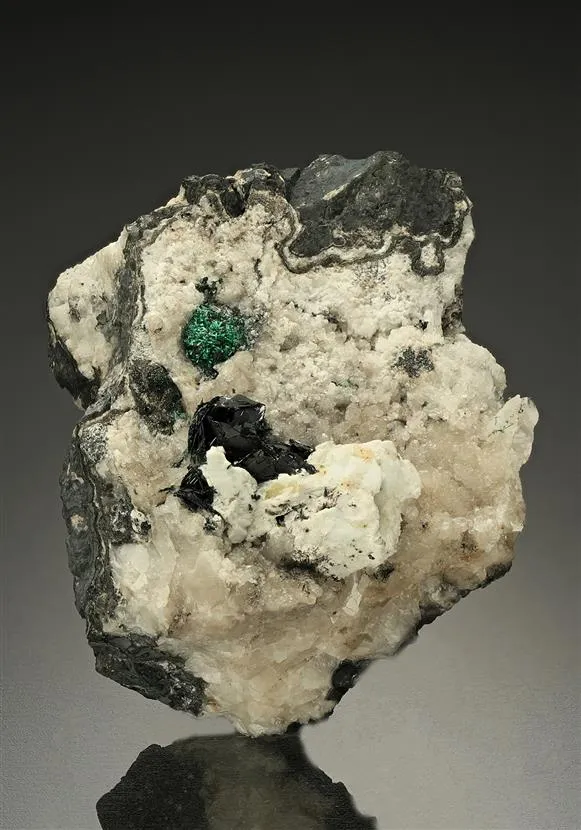 Crednerite with Hydrocerussite Malachite and Calcite image
