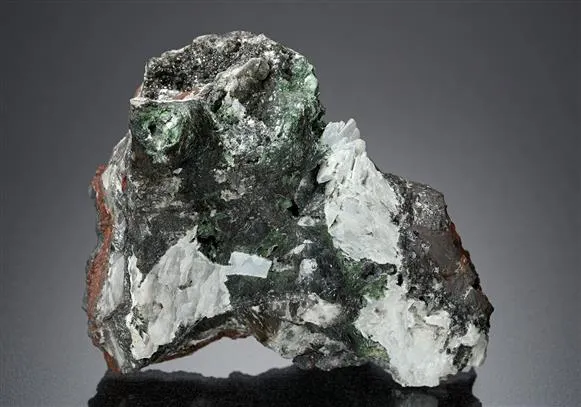 Crednerite with Pyrolusite Hydrocerussite and Malachite image