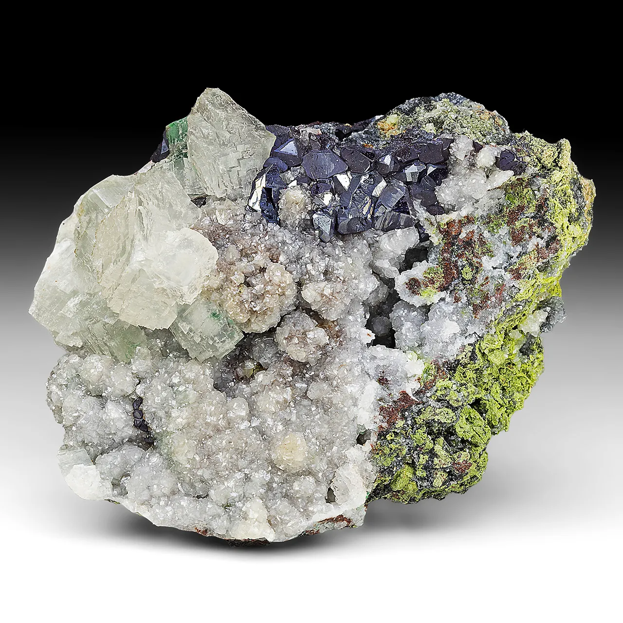 Cuprite with Calcite, Dolomite, Conichalcite - image 1