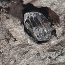 Diamond quartz in a black geode from Ribiers in France. Quartz are well crystallized and shiny, the glossy black matrix makes the crystals - image 4