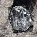 Diamond quartz in a black geode from Ribiers in France. Quartz are well crystallized and shiny, the glossy black matrix makes the crystals - image 8