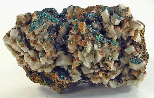 Dioptase, Calcite (Var: Plumboan Calcite) image