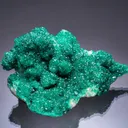 Dioptase with Duftite on Calcite - image 1
