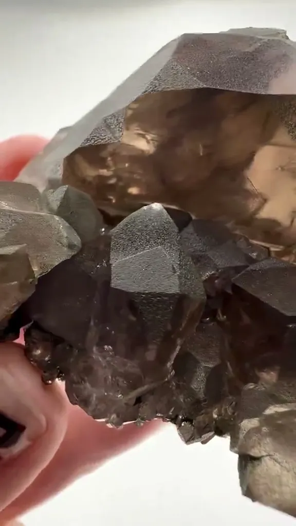 Discover the breathtaking beauty of Smoky Quartz Gwindel Cluster from… - image 4